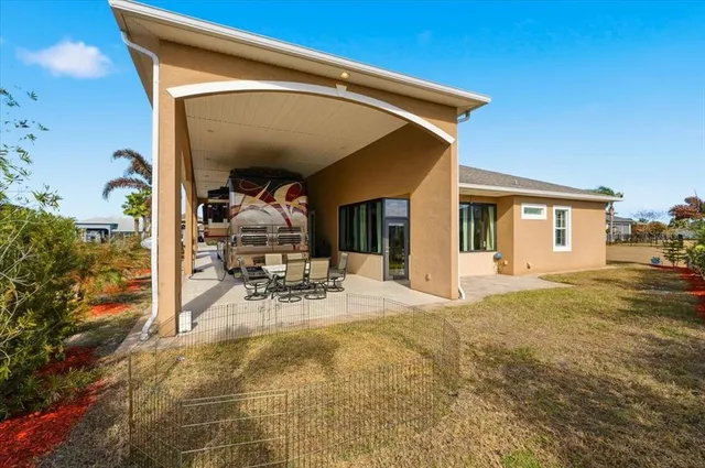 a view of backyard of a house