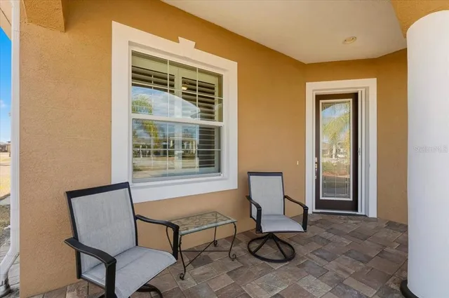 a bedroom with furniture and a bed