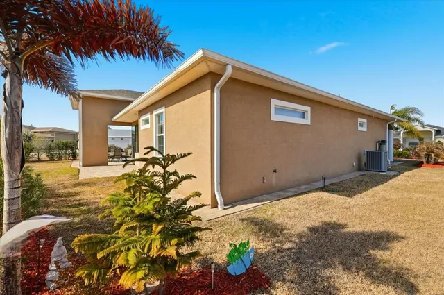 a view of garage with view of living room