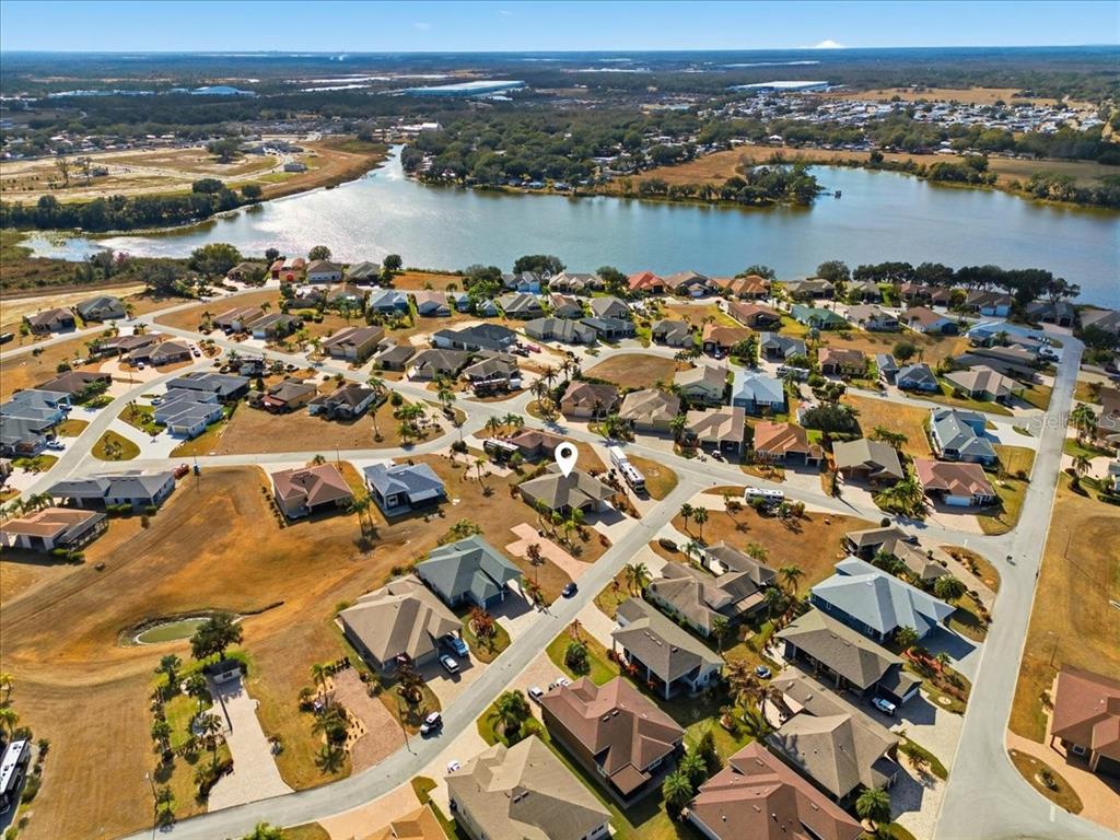 708 Teaberry Trail Polk City, FL 33868 - Photo 9 of 46 an aerial view of a houses with ocean view