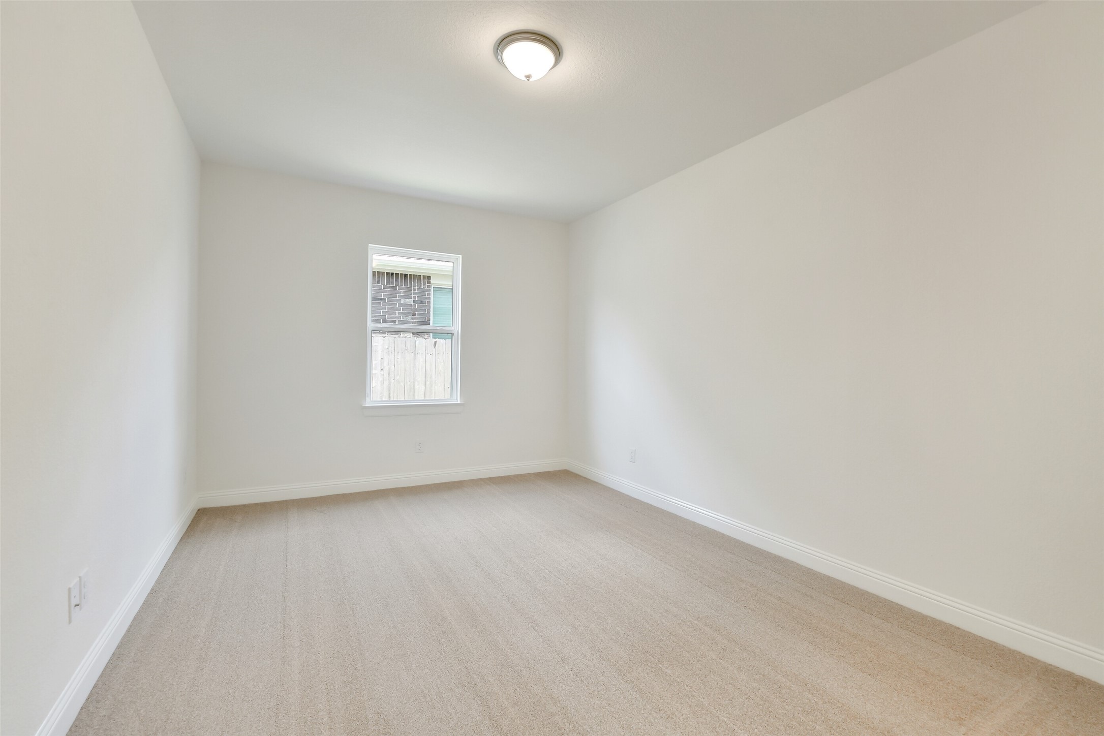 16119 Rustling Wds Road Conroe, TX 77302 - Photo 25 of 43 an empty room with a window