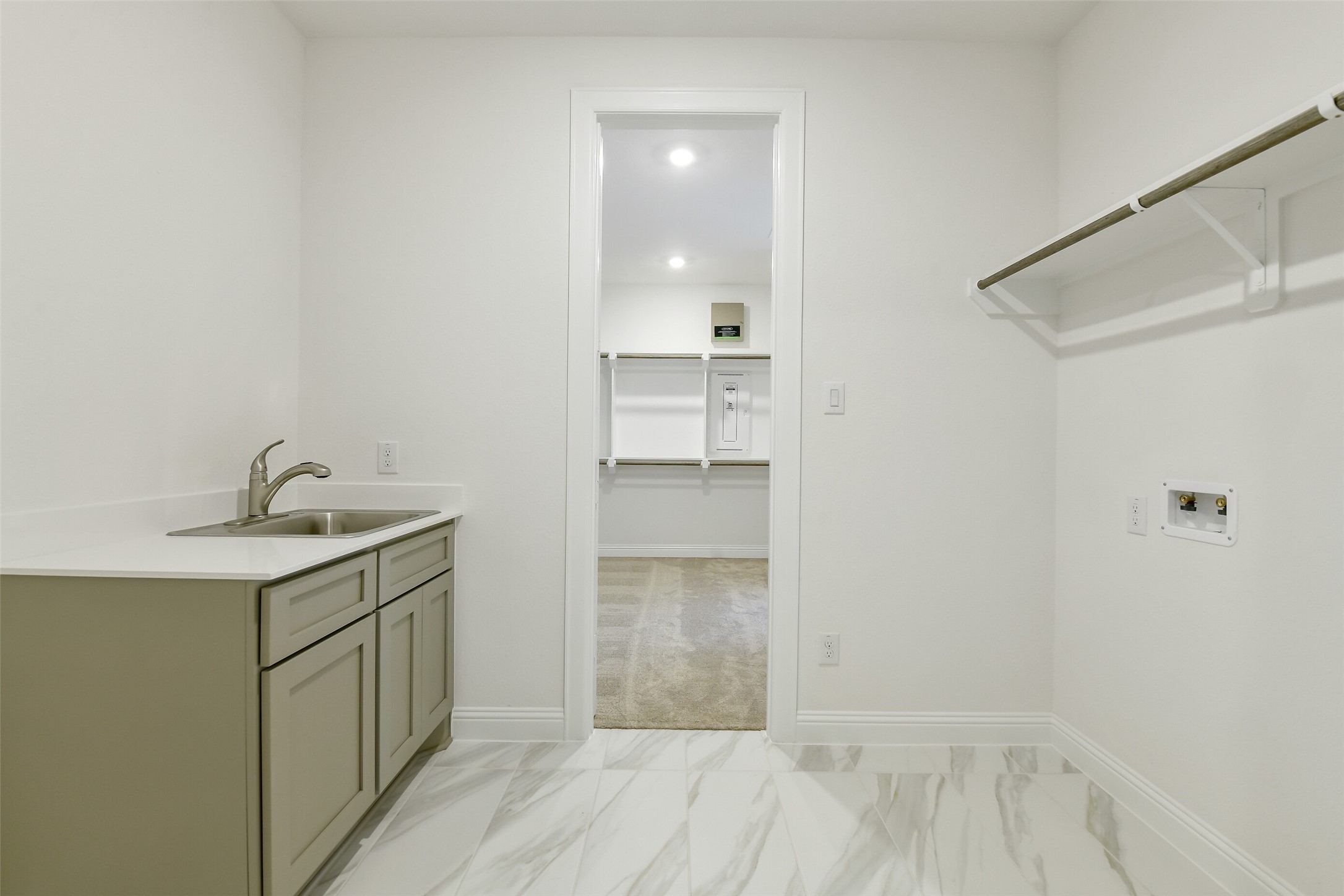 16119 Rustling Wds Road Conroe, TX 77302 - Photo 33 of 43 a bathroom with a sink and mirror