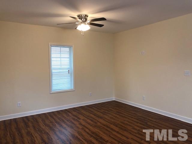 520 Branch Street Raleigh, NC 27601 - Photo 2 of 13 wooden floor in an empty room with a window