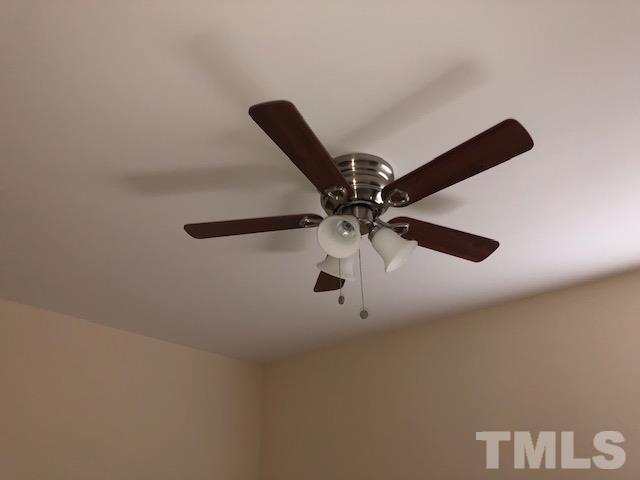 520 Branch Street Raleigh, NC 27601 - Photo 10 of 13 a view of a room with a ceiling fan and wooden floor
