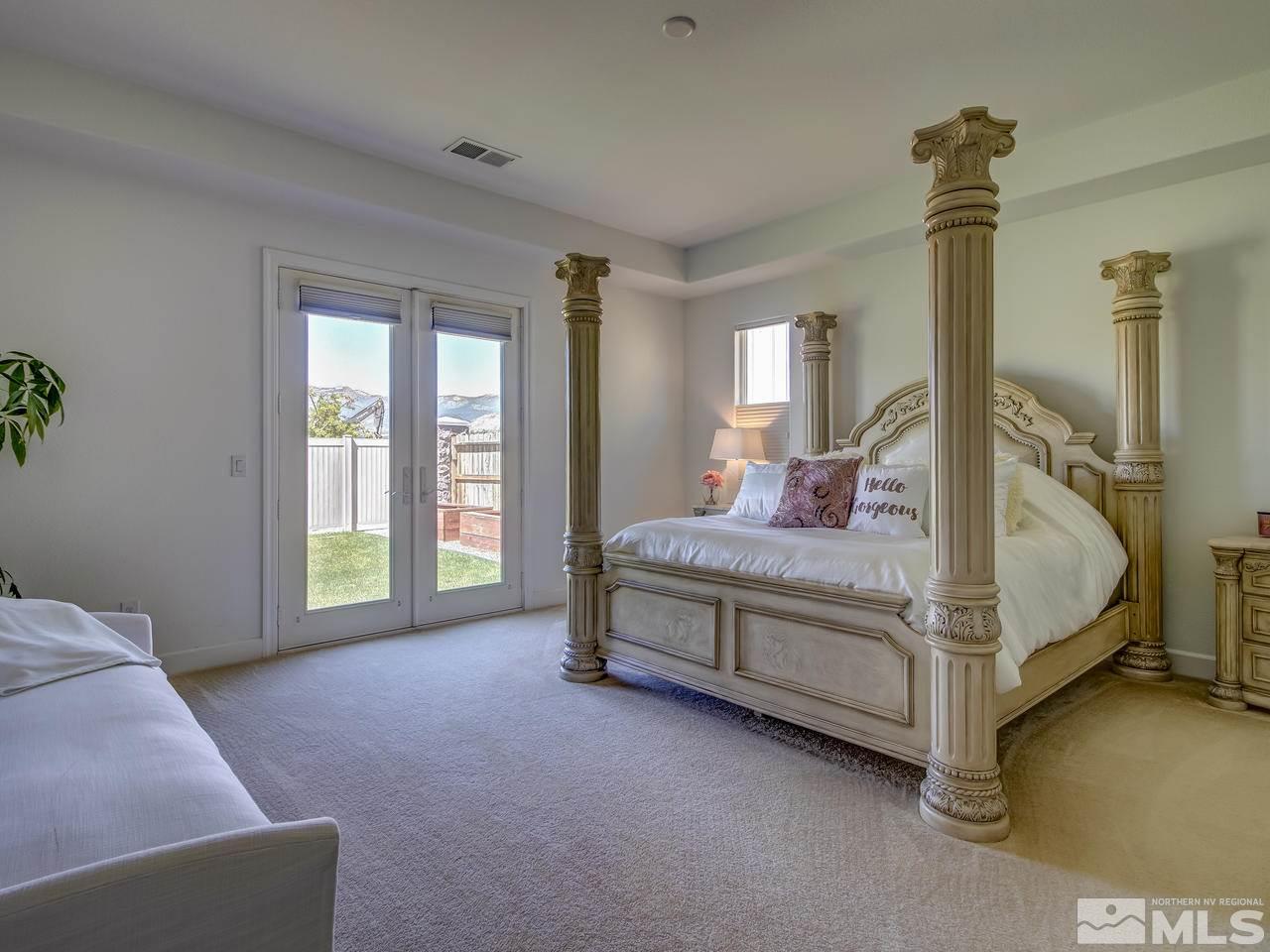 2020 Blue Boy Lane Reno, NV 89521 - Photo 12 of 20 a bed room with a bed and a chair