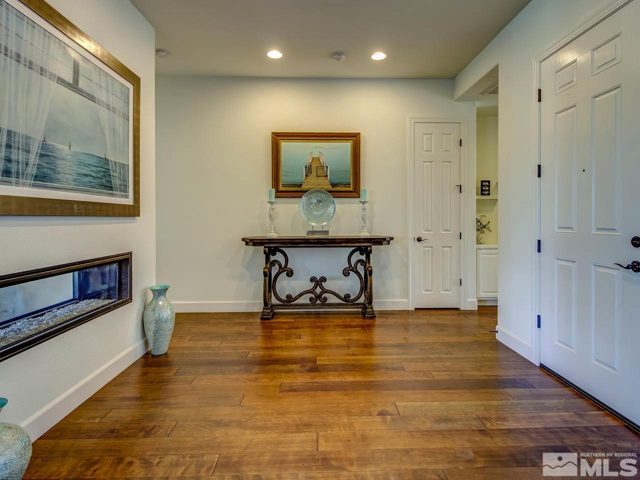 2020 Blue Boy Lane Reno, NV 89521 - Photo 3 of 20 a view of a hallway with a table and couch