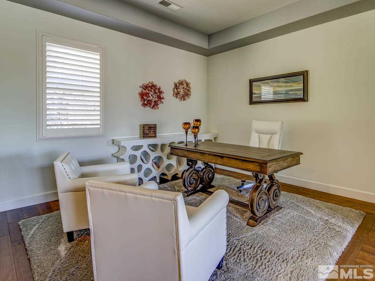 2020 Blue Boy Lane Reno, NV 89521 - Photo 4 of 20 a living room with a couch and a table