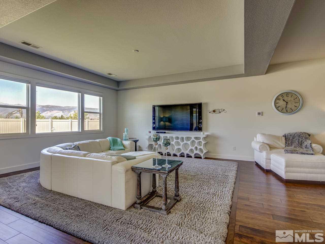 2020 Blue Boy Lane Reno, NV 89521 - Photo 10 of 20 a living room with furniture and a flat screen tv