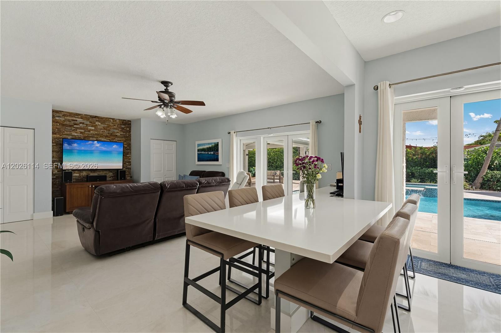 9641 Southwest 66th Street Miami, FL 33173 - Photo 18 of 57 a view of a dining room with furniture