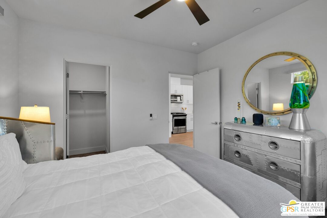 138 The River Palm Springs, CA 92262 - Photo 24 of 47 a bedroom with a bed and a dresser