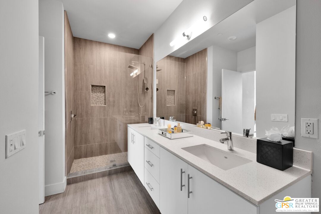 138 The River Palm Springs, CA 92262 - Photo 26 of 47 a bathroom with a double vanity sink mirror and double