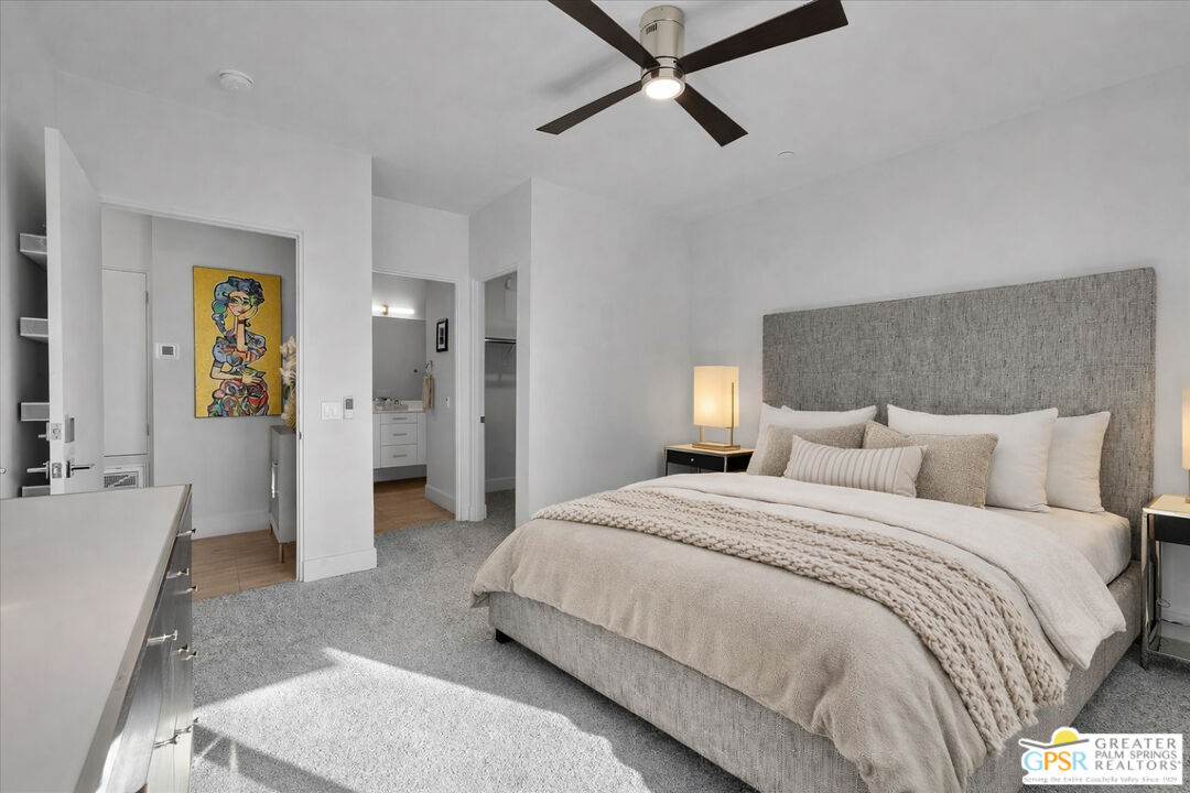 138 The River Palm Springs, CA 92262 - Photo 28 of 47 a spacious bedroom with a bed and furniture
