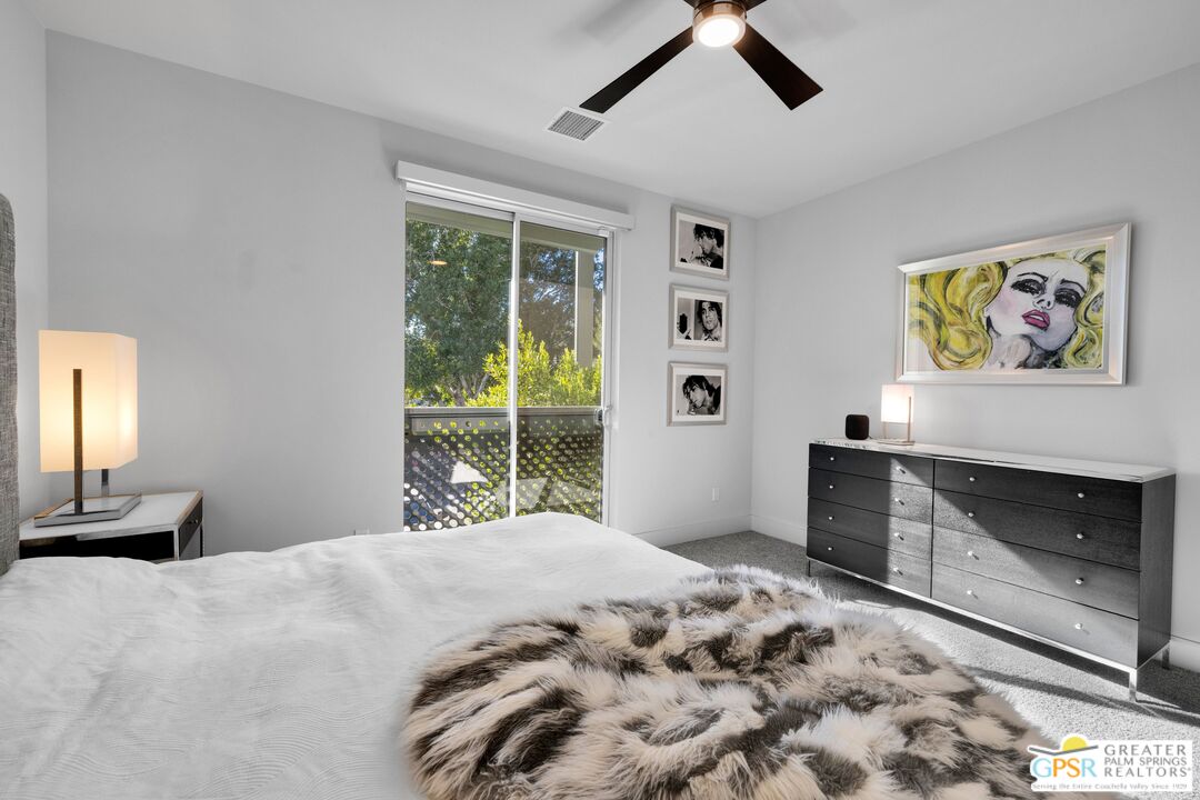 138 The River Palm Springs, CA 92262 - Photo 29 of 47 a bedroom with a bed and a window