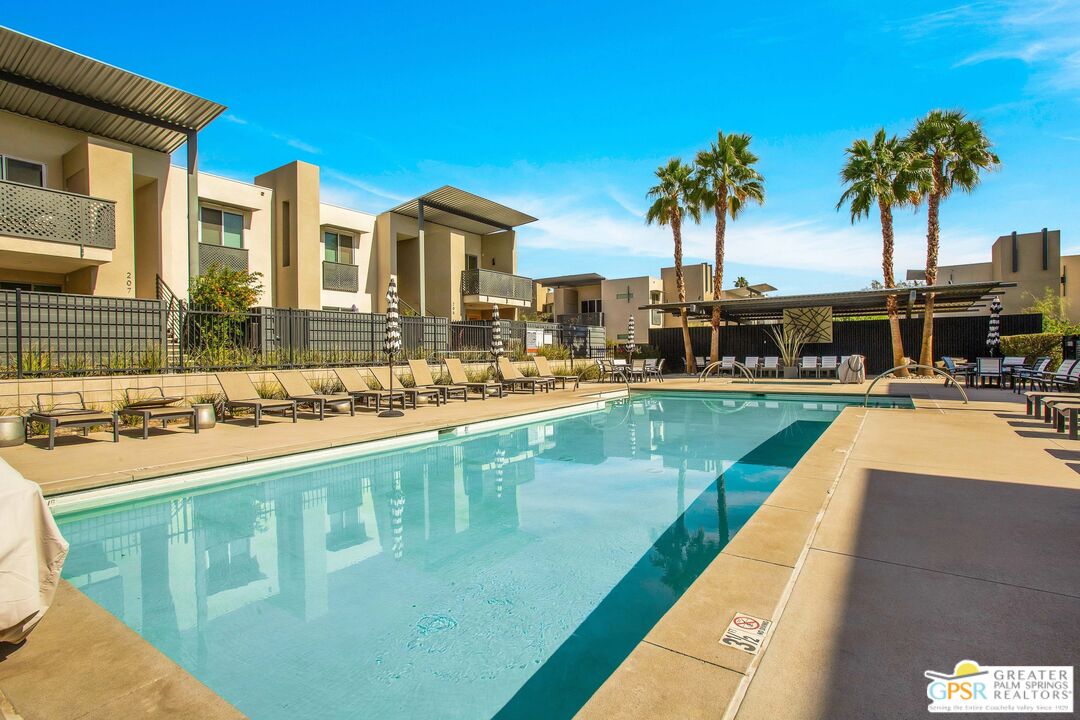 138 The River Palm Springs, CA 92262 - Photo 42 of 47 a view of a swimming pool with outdoor seating