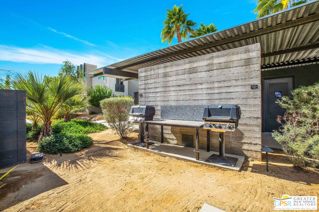 138 The River Palm Springs, CA 92262 - Photo 45 of 47 a view of a chairs and table in the patio