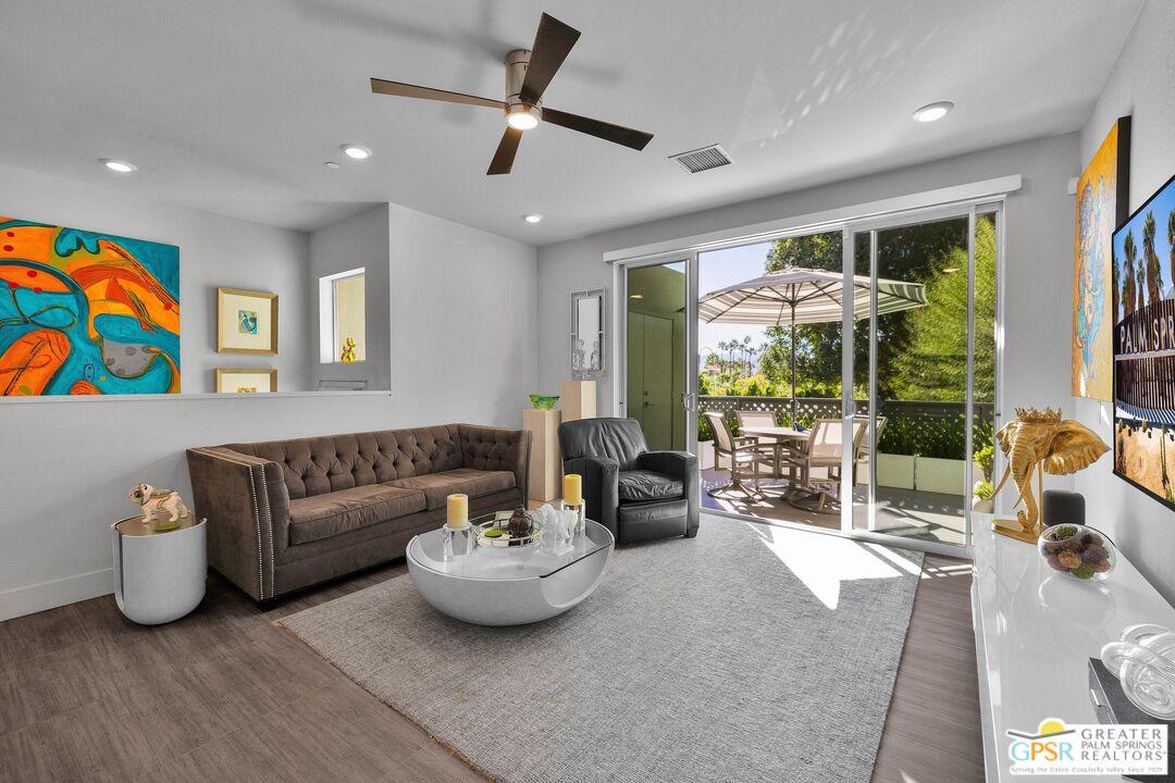 138 The River Palm Springs, CA 92262 - Photo 8 of 47 a living room with furniture and a flat screen tv