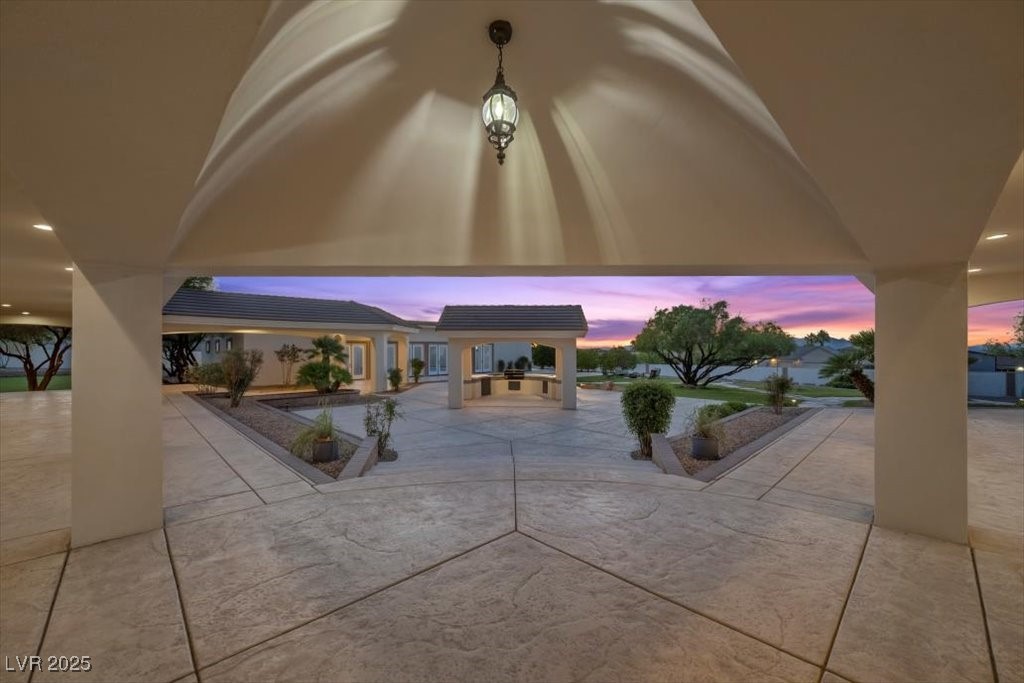 640 Quail Covey Road Henderson, NV 89002 - Photo 67 of 75 View of patio / terrace at dusk