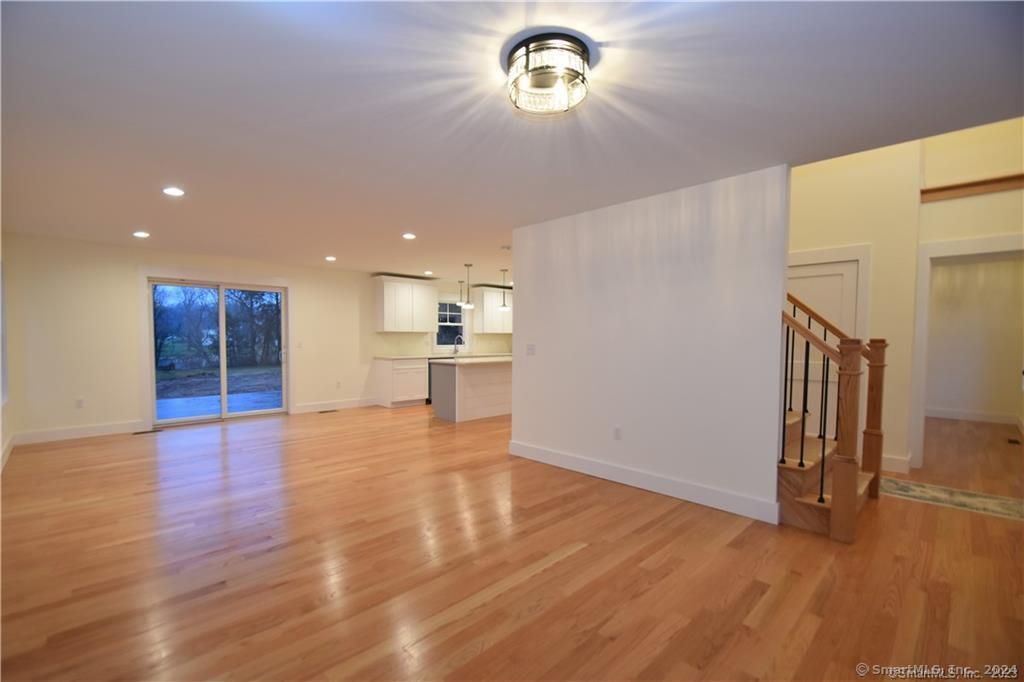 Mile Hill Road Tolland, CT 06084 - Photo 14 of 32 a view of empty room with wooden floor