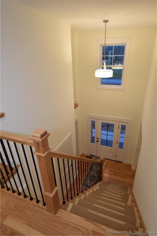 Mile Hill Road Tolland, CT 06084 - Photo 32 of 32 a view of a balcony with wooden floor and stairs