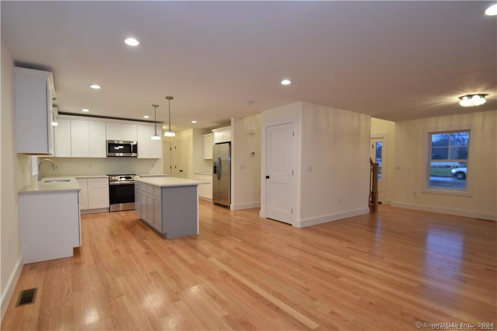 Mile Hill Road Tolland, CT 06084 - Photo 10 of 32 a large kitchen with a lot of counter space and stainless steel appliances
