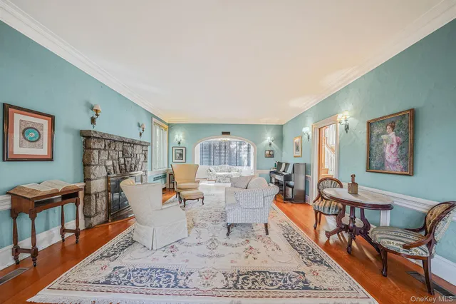 a living room with furniture and a rug