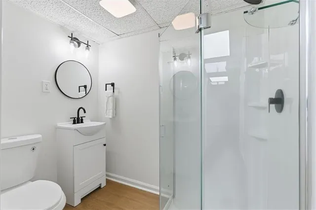 a view of a wooden deck and a yard