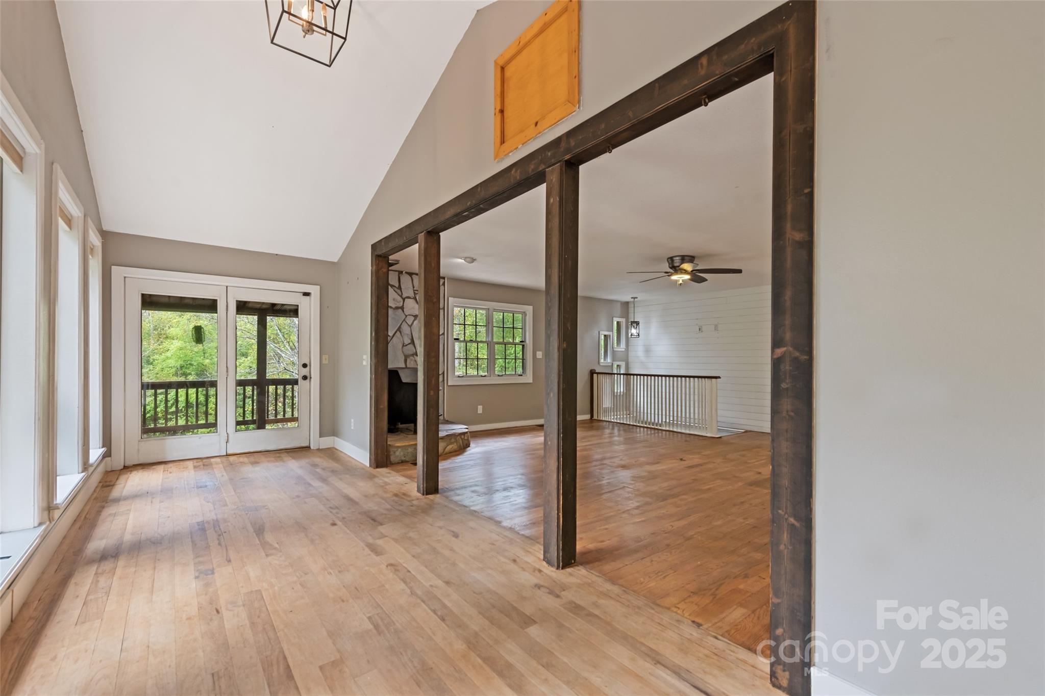 940 Haynes Cove Clyde, NC 28721 - Photo 15 of 48 wooden floor in an empty room with a window