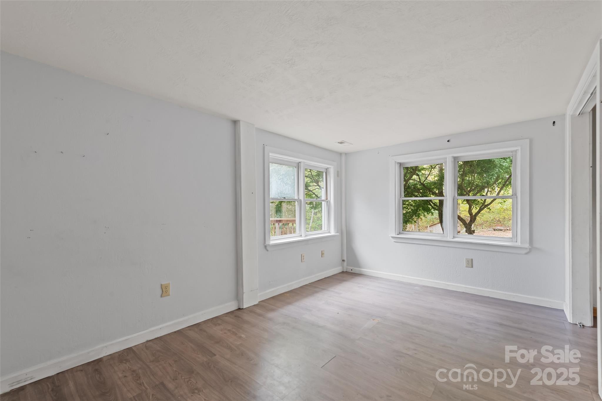 940 Haynes Cove Clyde, NC 28721 - Photo 28 of 48 an empty room with windows