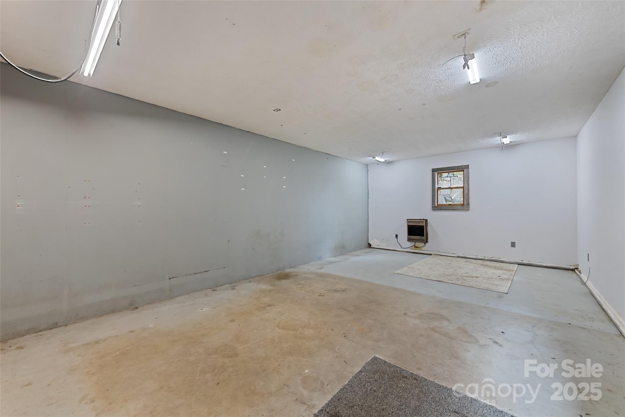 940 Haynes Cove Clyde, NC 28721 - Photo 35 of 48 a view of empty room with windows