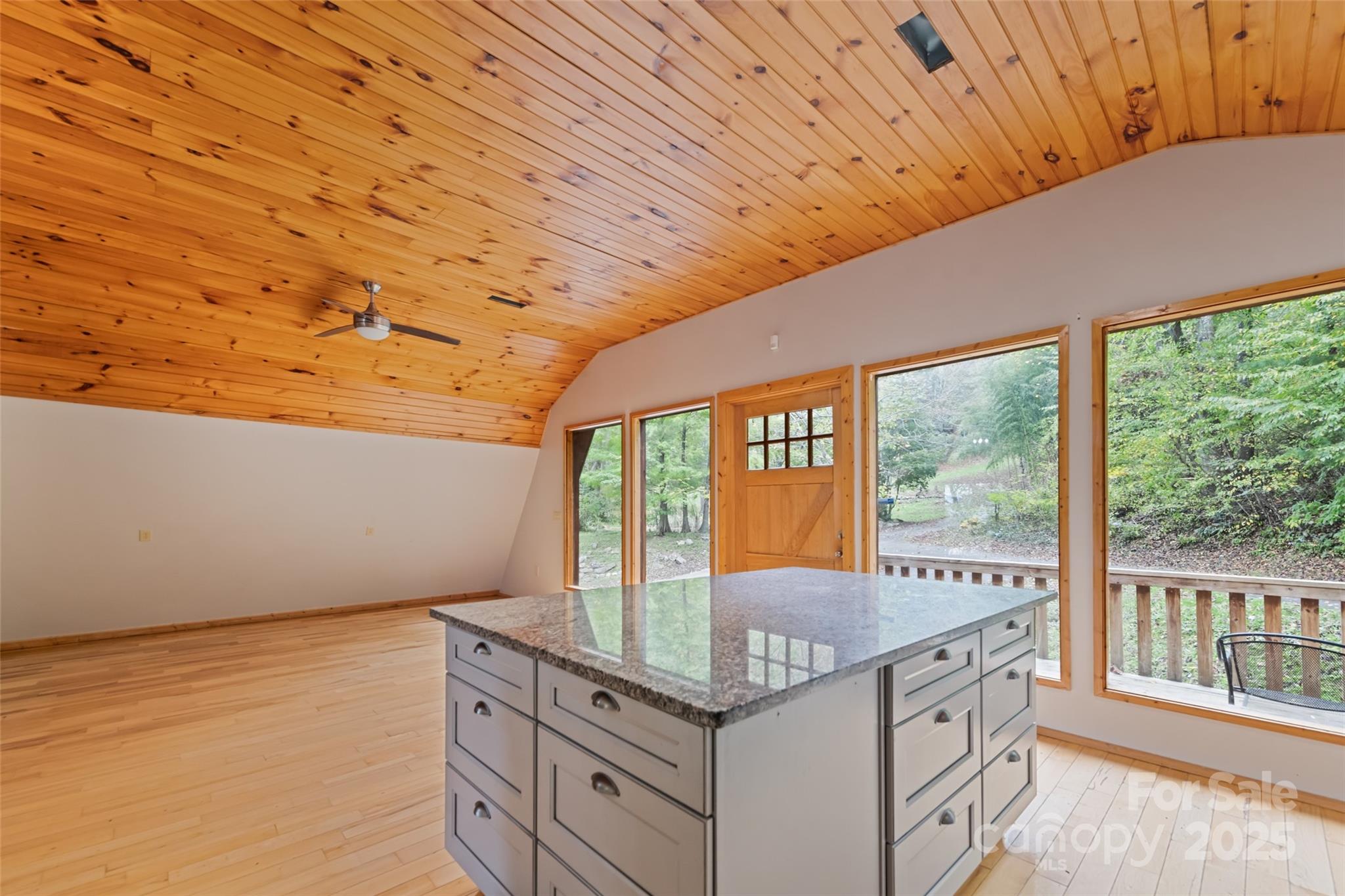 940 Haynes Cove Clyde, NC 28721 - Photo 42 of 48 a kitchen with granite countertop a stove and a sink