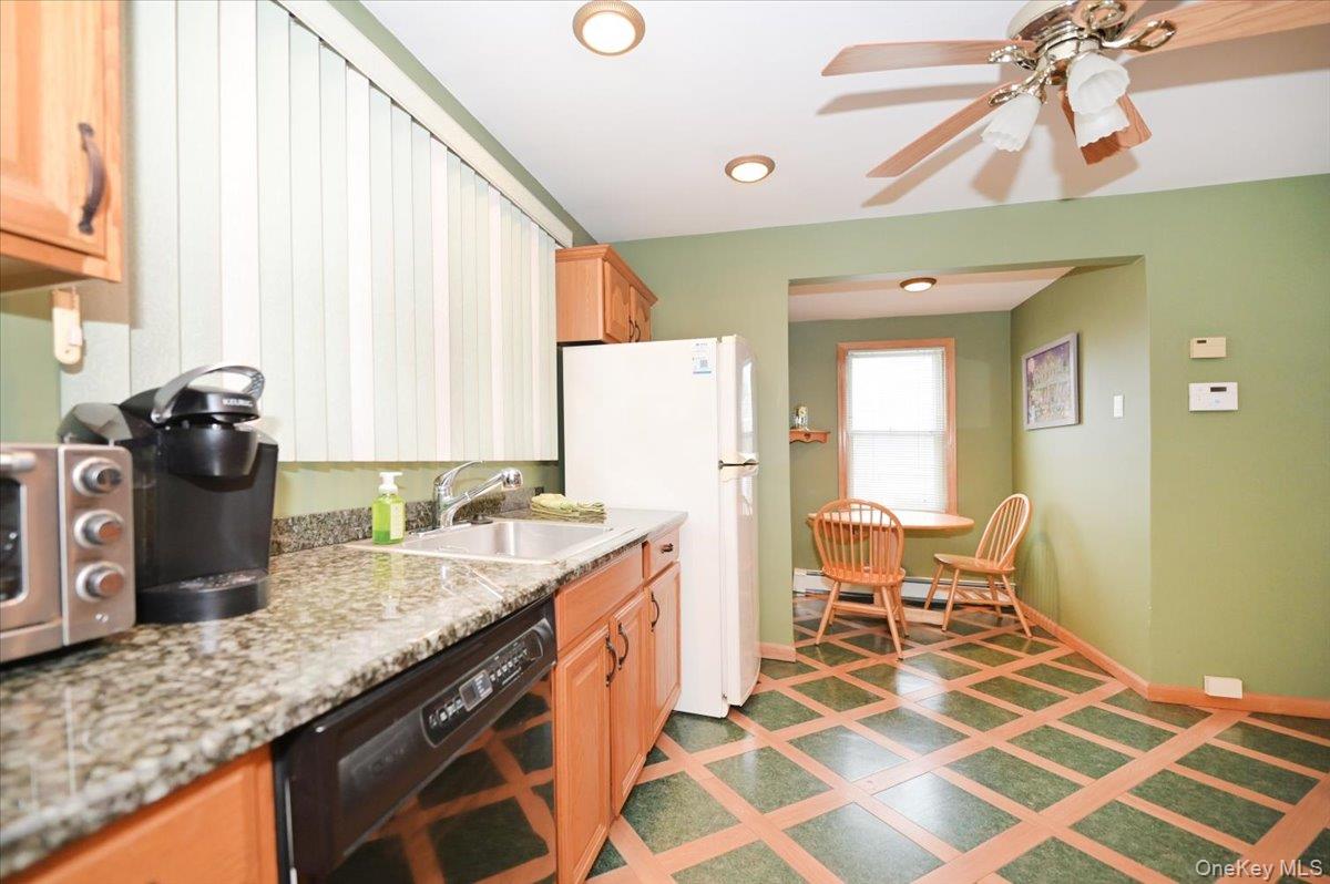 2016 Abbot Avenue Merrick, NY 11566 - Photo 15 of 26 a spacious bathroom with a granite countertop sink and a window