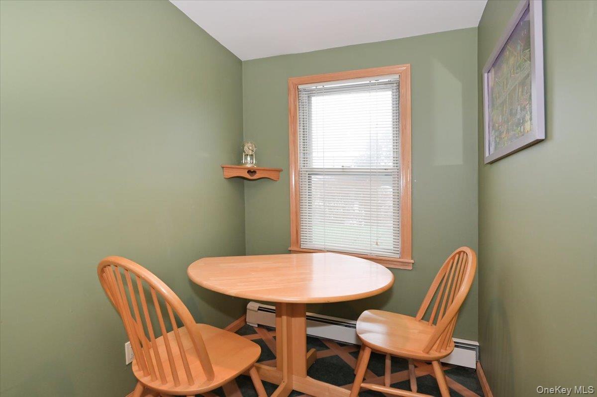 2016 Abbot Avenue Merrick, NY 11566 - Photo 16 of 26 a table and chairs in a room