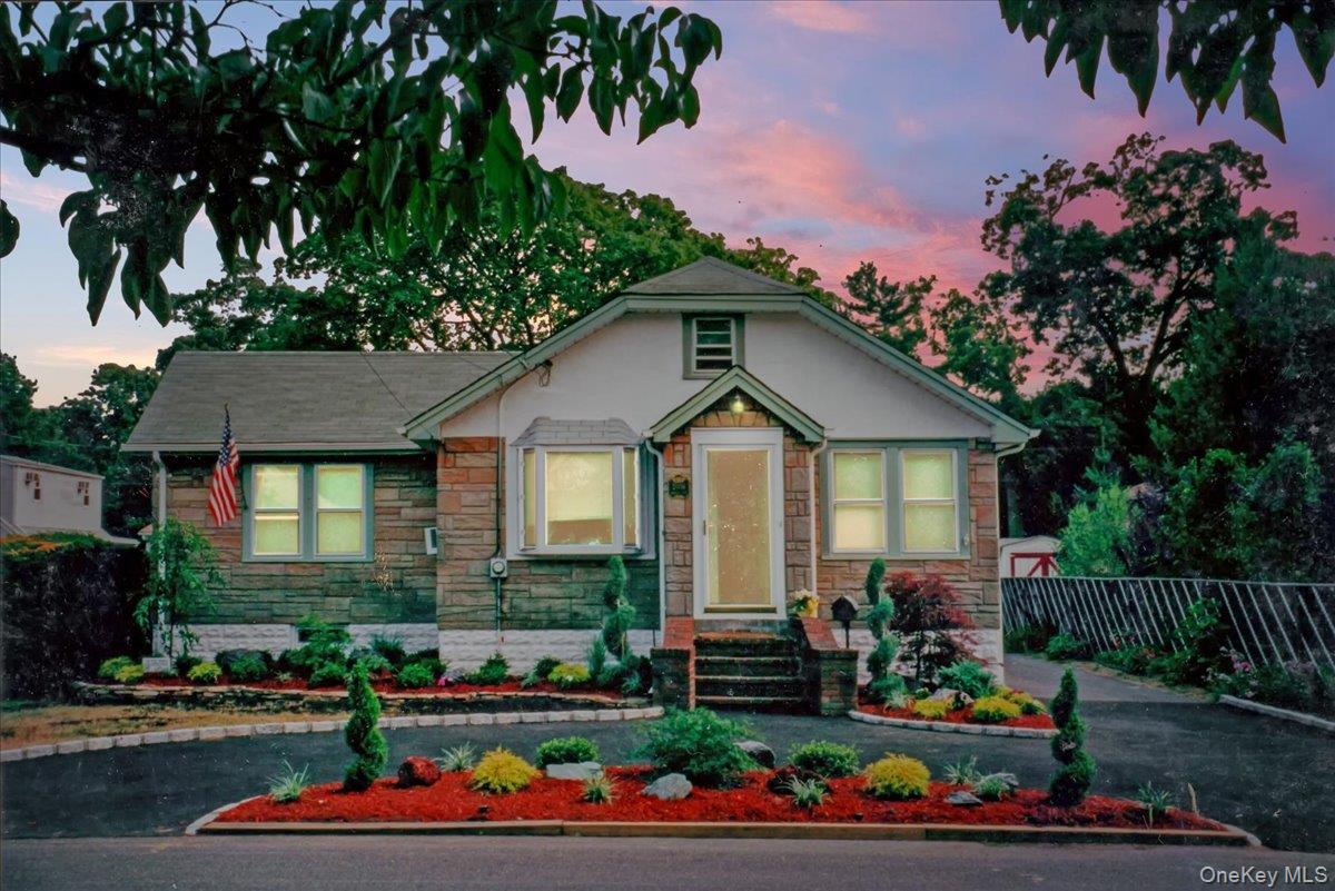 2016 Abbot Avenue Merrick, NY 11566 - Photo 2 of 26 a front view of a house with a yard