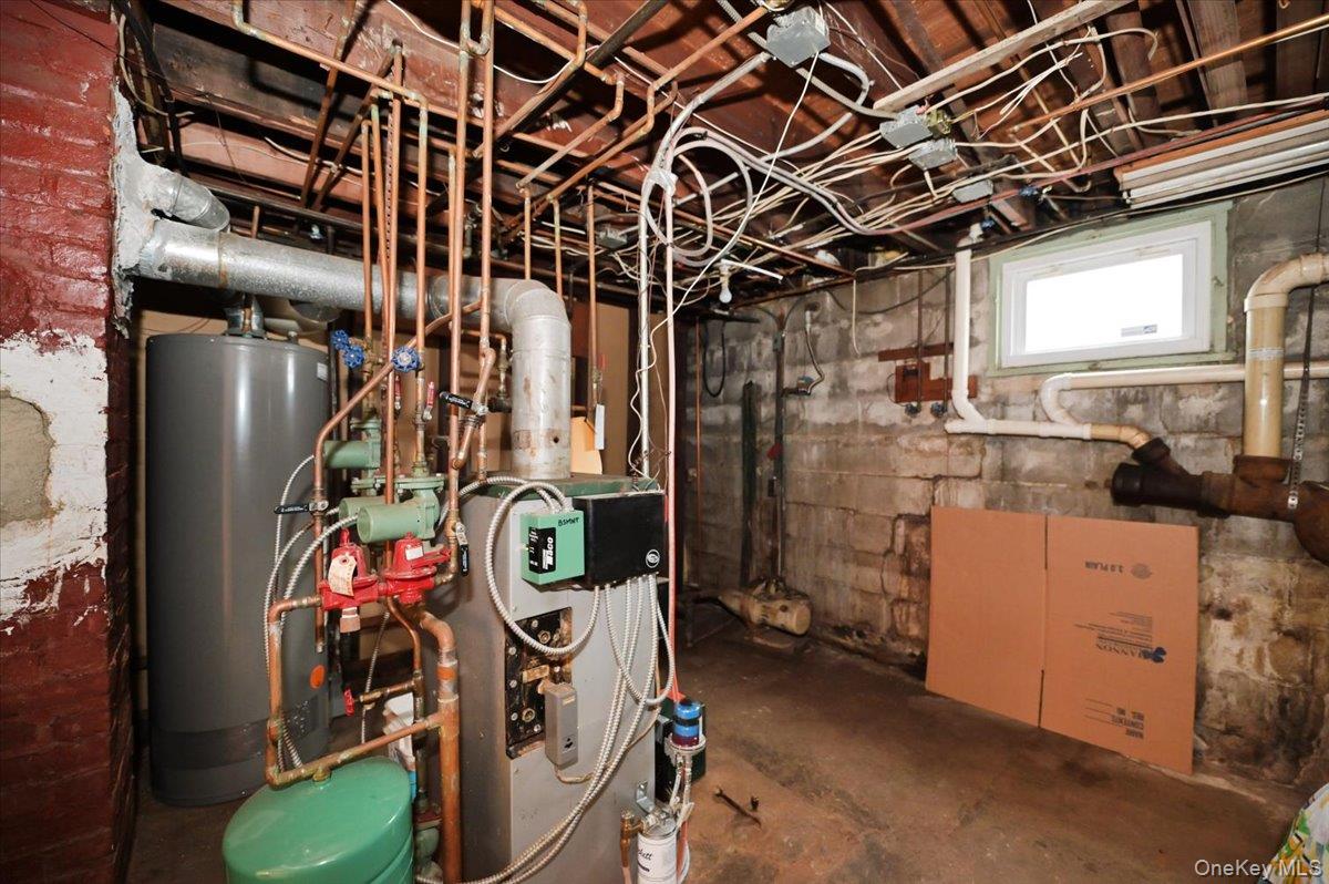2016 Abbot Avenue Merrick, NY 11566 - Photo 22 of 26 a view of a storage room with washer and dryer