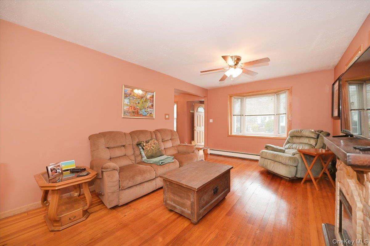 2016 Abbot Avenue Merrick, NY 11566 - Photo 8 of 26 a living room with furniture and wooden floor