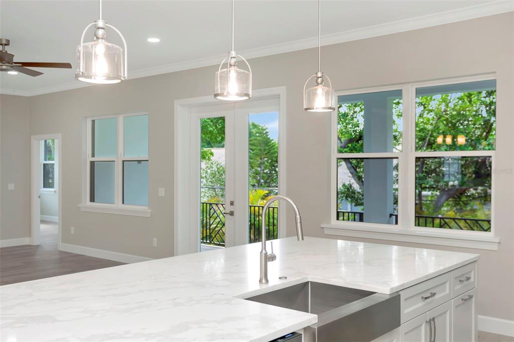 108 Irwin Street East Safety Harbor, FL 34695 - Photo 37 of 79 a kitchen with sink and window