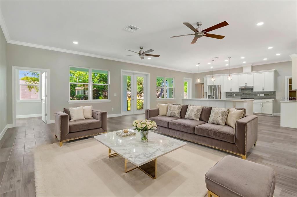 108 Irwin Street East Safety Harbor, FL 34695 - Photo 43 of 79 a living room with furniture and a large window
