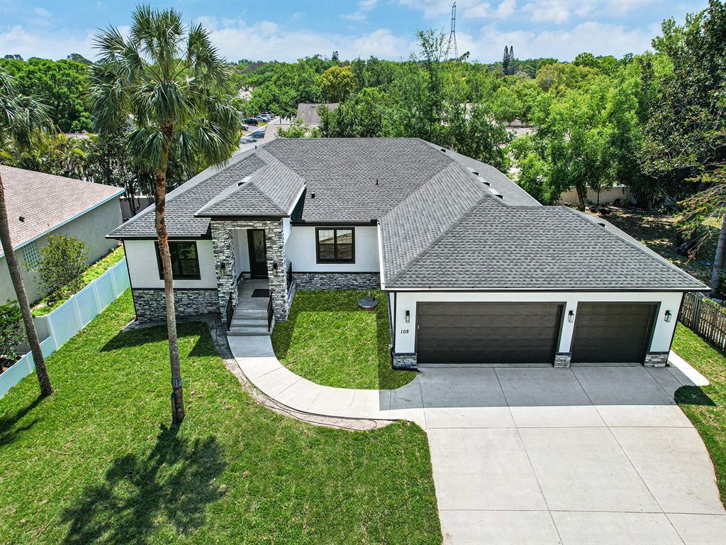 108 Irwin Street East Safety Harbor, FL 34695 - Photo 5 of 79 a aerial view of a house