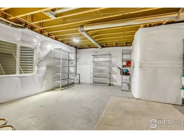 a view of a room with storage and utility room