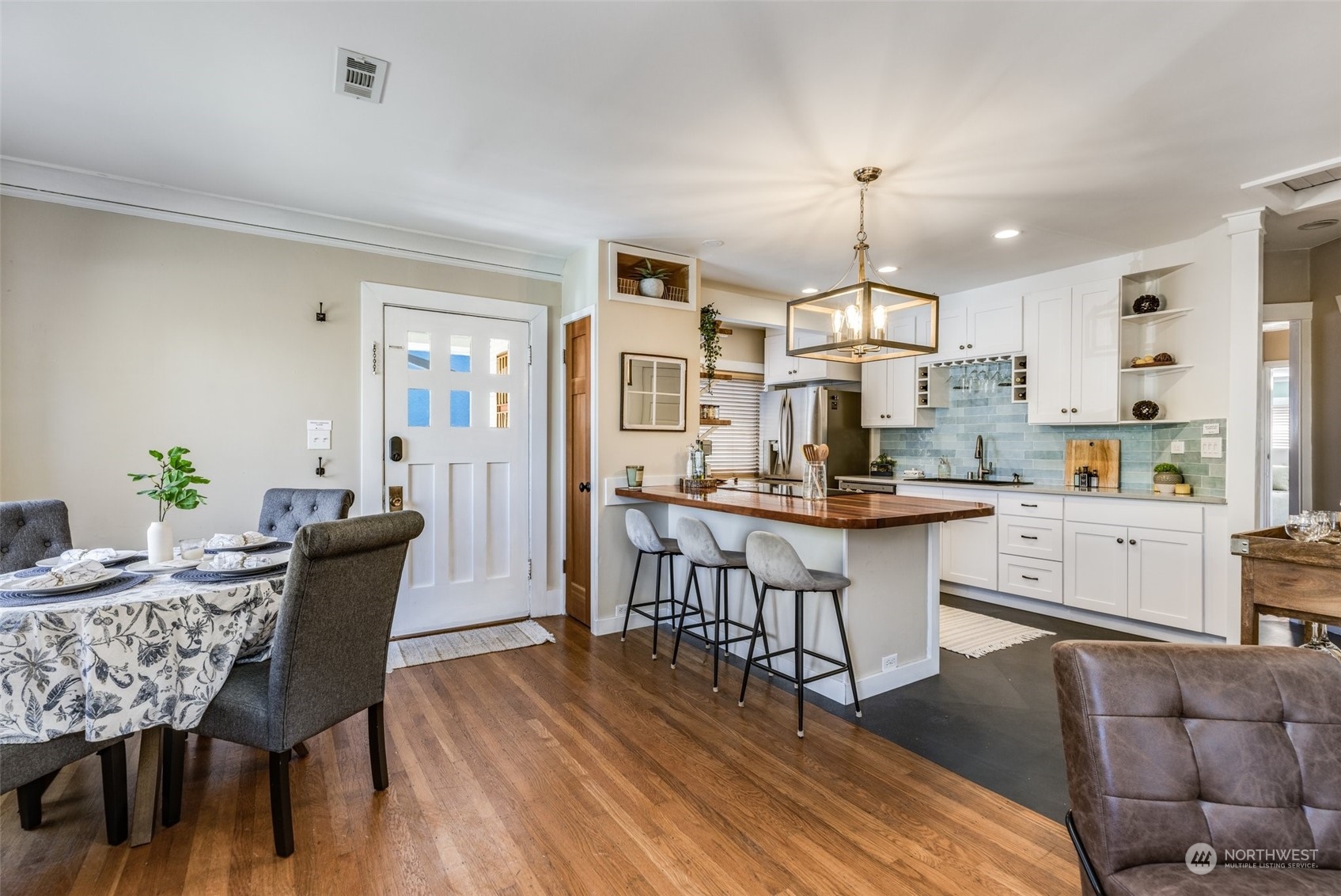 343 North 81st Street Seattle, WA 98103 - Photo 11 of 38 a view of kitchen with cabinets and wooden floor
