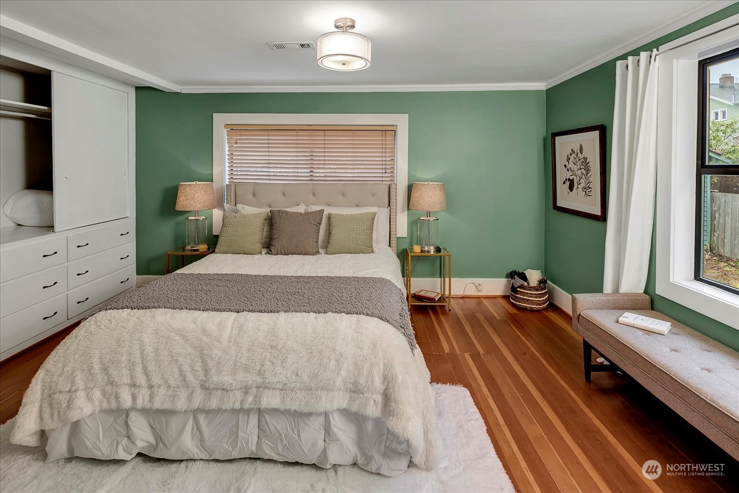 343 North 81st Street Seattle, WA 98103 - Photo 16 of 38 a bedroom with a bed and window
