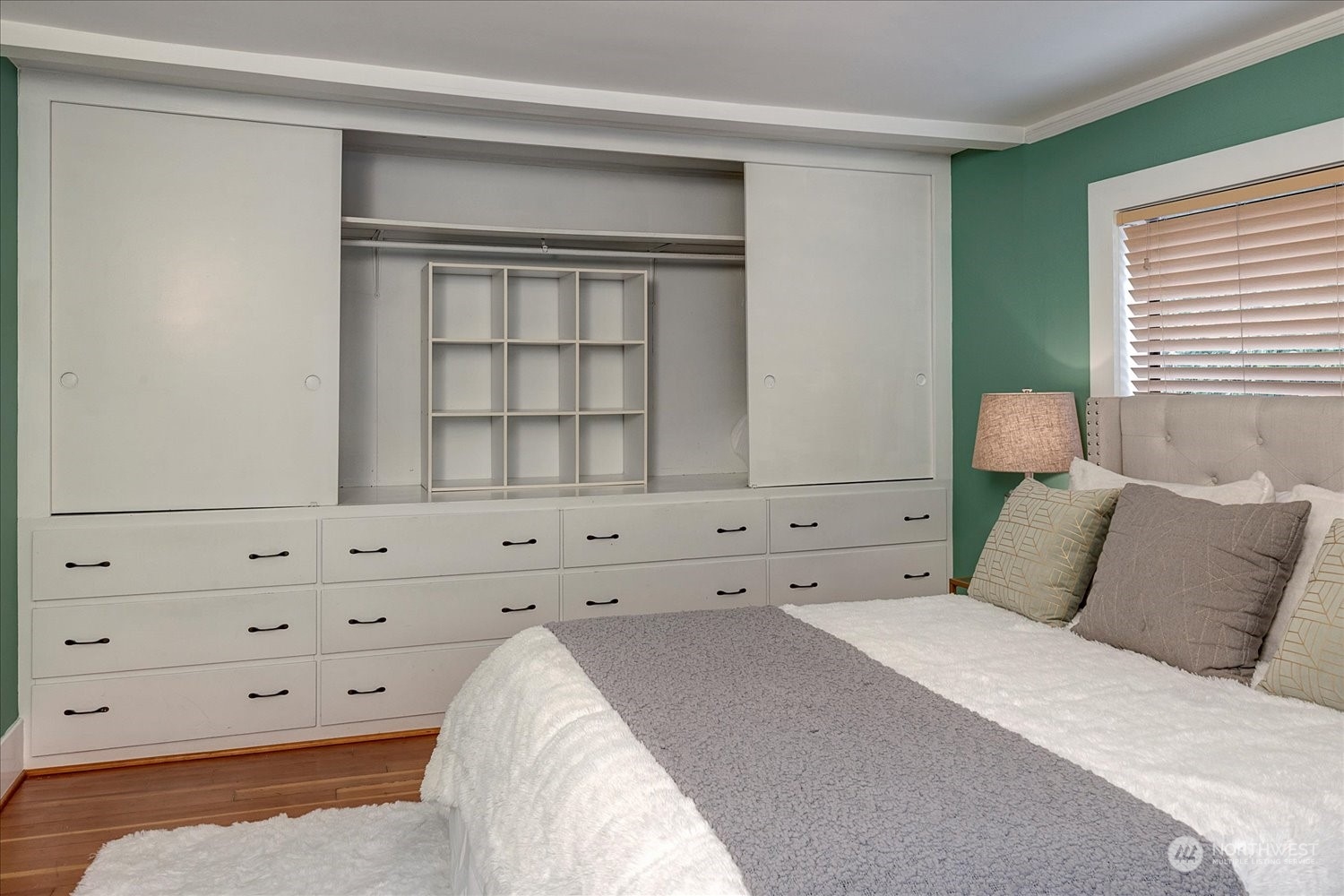 343 North 81st Street Seattle, WA 98103 - Photo 18 of 38 a bedroom with a bed and a window