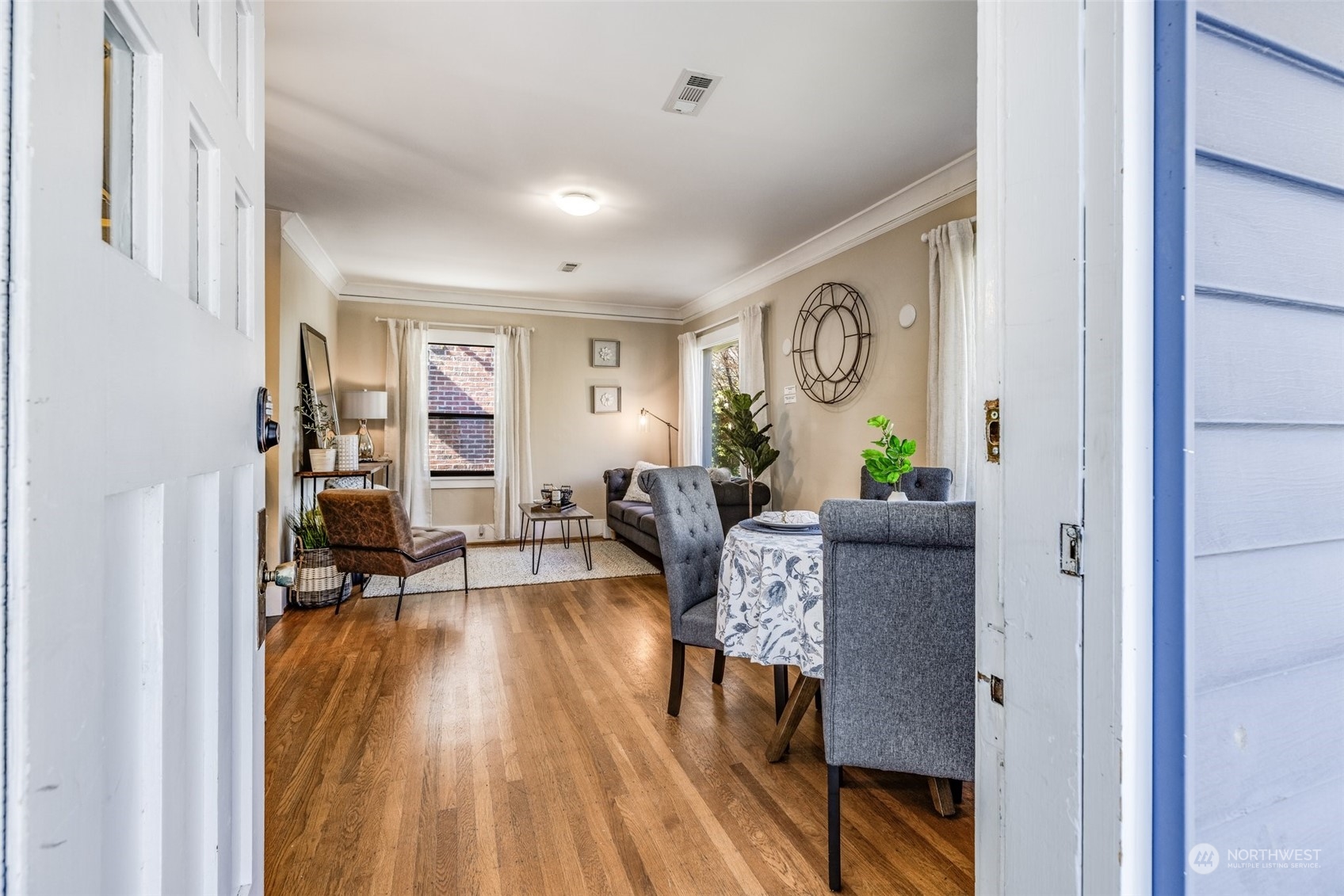 343 North 81st Street Seattle, WA 98103 - Photo 2 of 38 a living room with furniture and a wooden floor