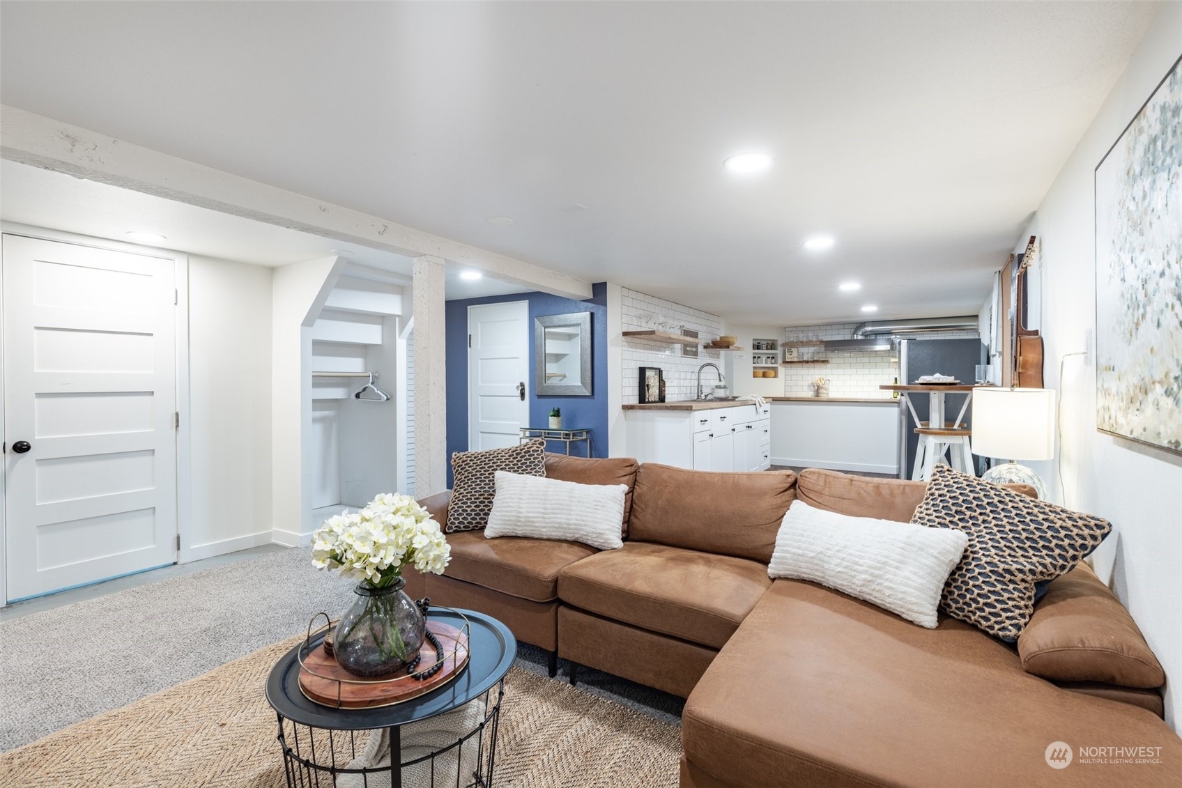 343 North 81st Street Seattle, WA 98103 - Photo 27 of 38 a living room with furniture and a dining table