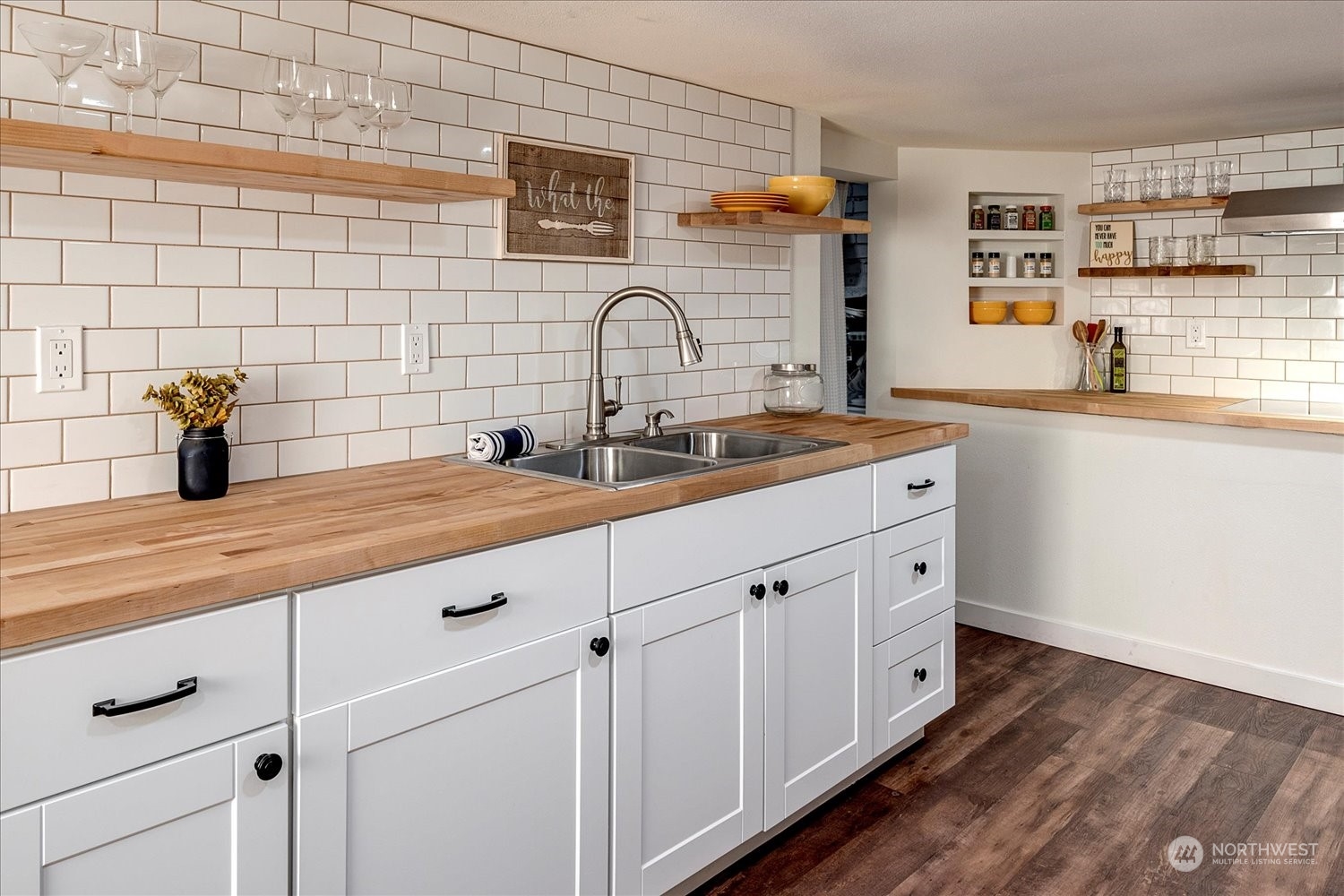 343 North 81st Street Seattle, WA 98103 - Photo 29 of 38 a kitchen with sink and cabinets