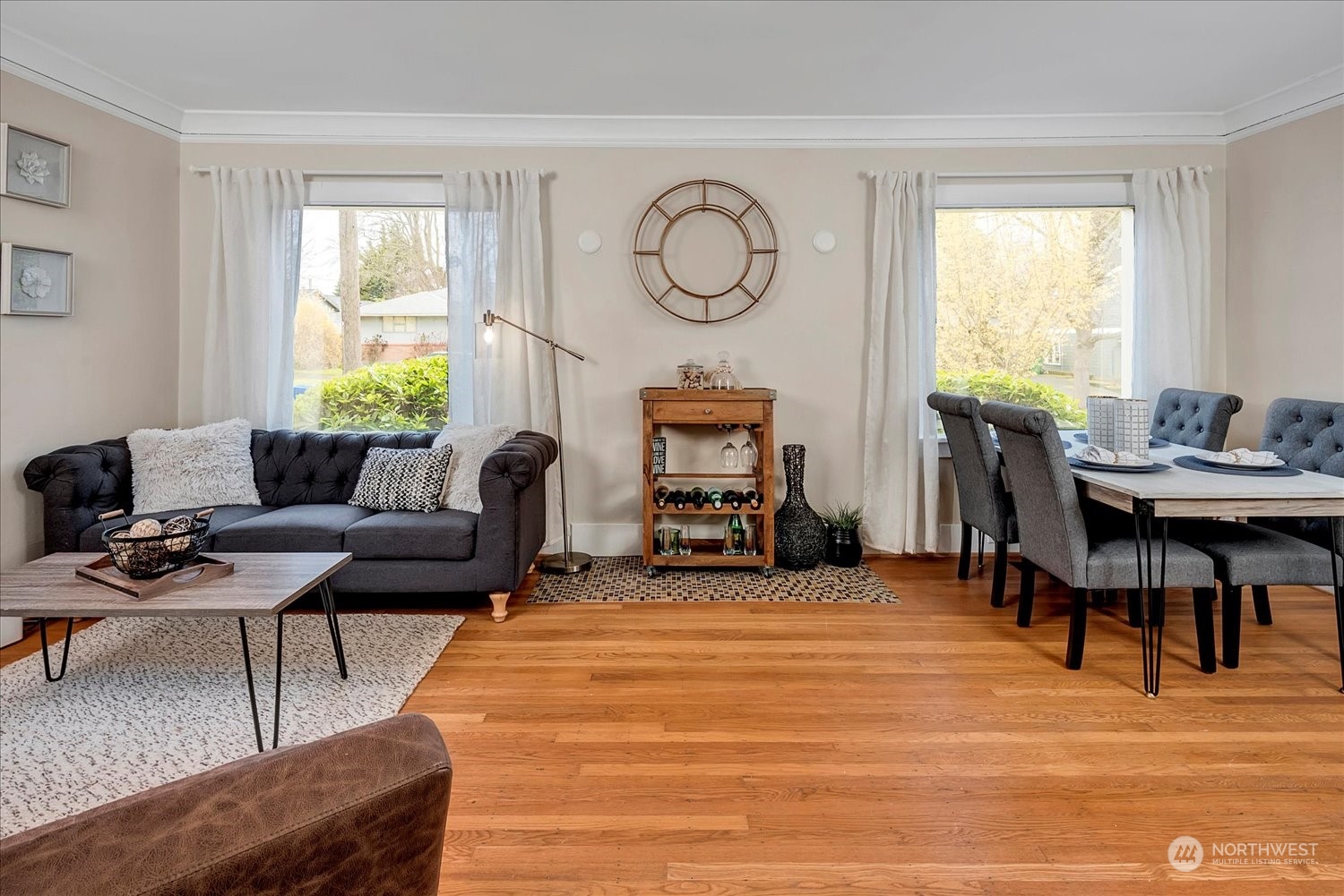 343 North 81st Street Seattle, WA 98103 - Photo 4 of 38 a living room with furniture and a large window