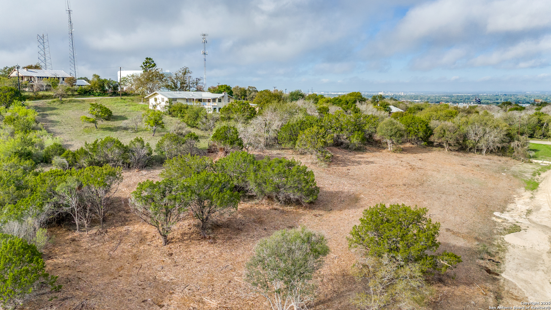 14 Wesp Way Live Oak, TX 78233 - Photo 10 of 10 a view of a pathway both side of grassy field with shrub