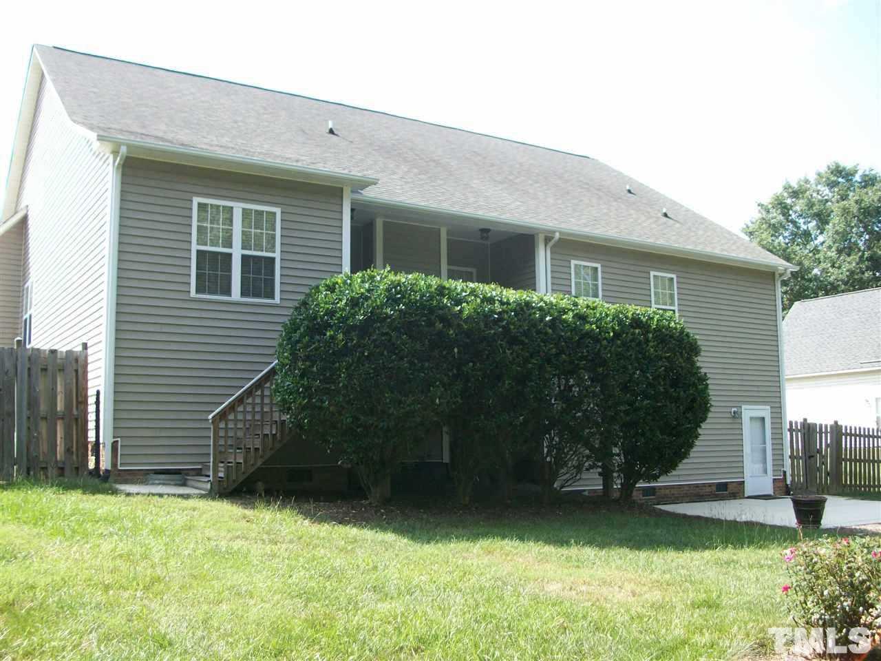 344 Steve Ridge Willow Spring, NC 27592 - Photo 15 of 18 a view of a house with a yard and a large window