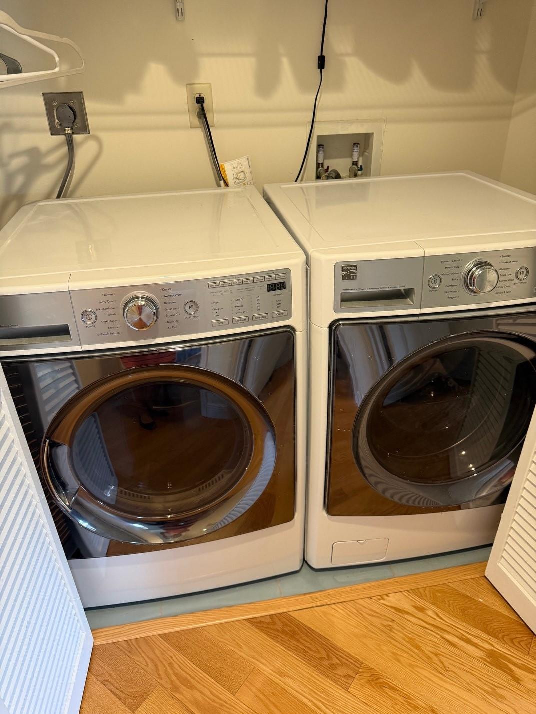 6102 Southeast Landing Way, Unit 13 Stuart, FL 34997 - Photo 12 of 14 a utility room with dryer and washer
