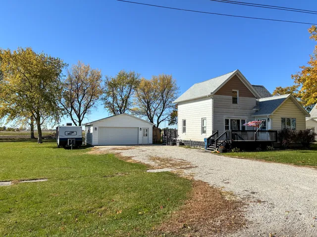 a view of a field with an trees